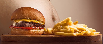 Дослідження: прибавка в вазі викликається вживанням певних продуктів, а не переїданням